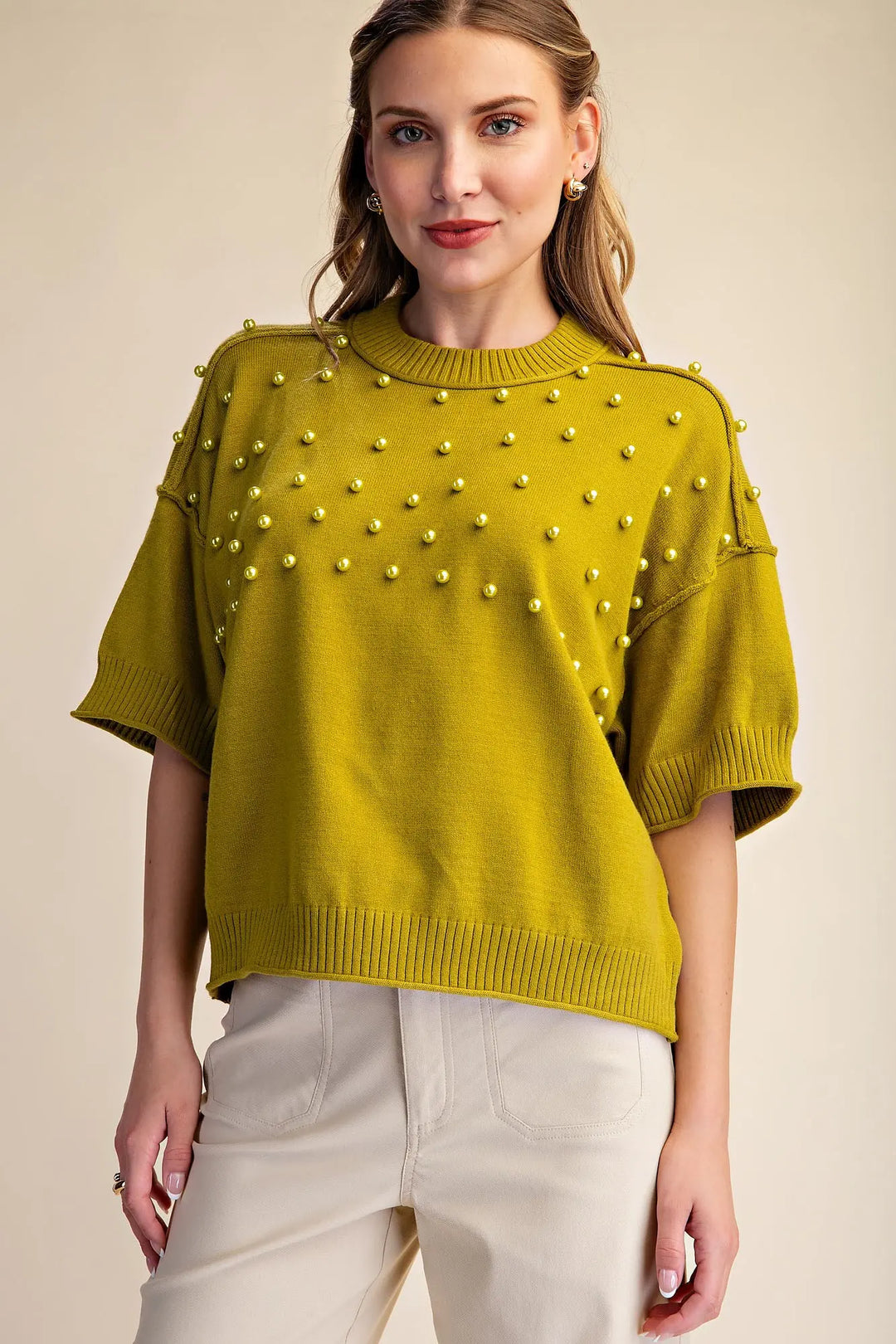 Light olive pearl embellished short sleeve crewneck sweater with ribbed hem and cuffs