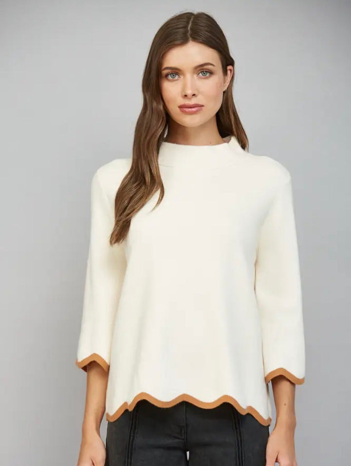 Cream scallop sweater angled front